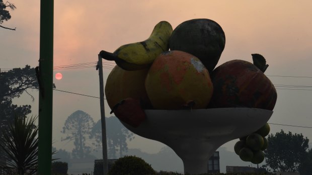 A red sunrise at Bilpin's big fruit bowl on a day of extreme fire danger, December 19, 2019.