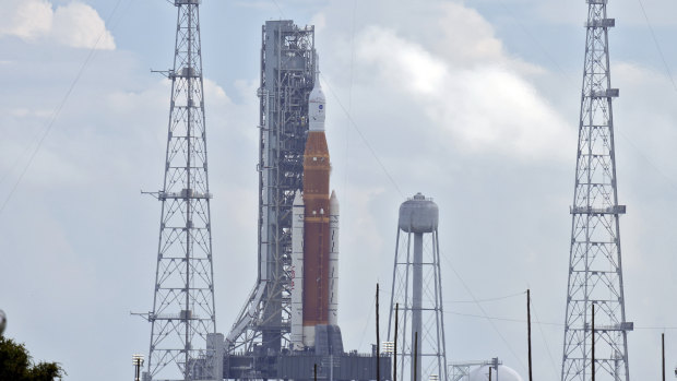 NASA’s new moon rocket sits on Launch Pad 39-B minutes after the launch was cancelled.