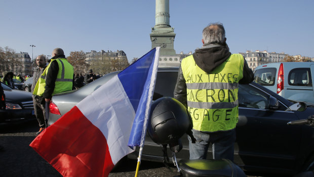 Yellow vest Protesters block the Place de la Bastille to protest against fuel taxes in Paris, France, on November 17.