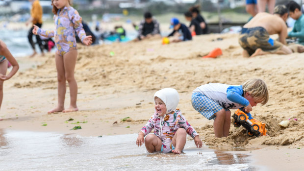 One-year-old Rose Strong enjoying the water at Frankston beach on Monday.