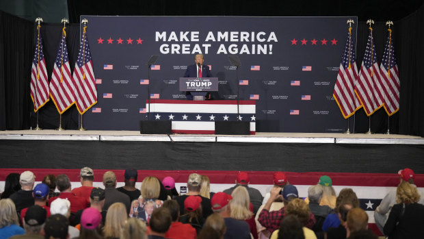 Former President Donald Trump speaks during a campaign rally in Iowa on Monday.