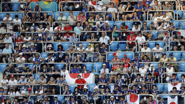Japan supporters watch the group H match between Japan and Poland at the Volgograd Arena.