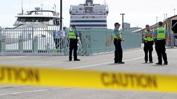 Police are seen at Fremantle Harbour on March 30 as Vasco da Gama passengers prepare for arrival at Rottnest island.