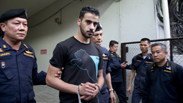 Call to arms: Thai prison guards lead Bahraini football player Hakeem al-Araibi from a courthouse in Bangkok.