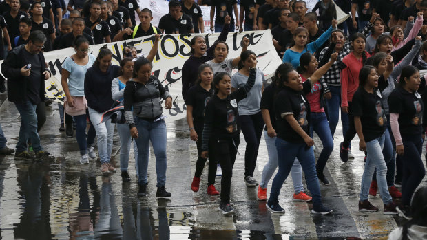 Relatives and students of 43 students from a rural teachers college, who disappeared four years ago, protest on the anniversary of their disappearance in Mexico City. 