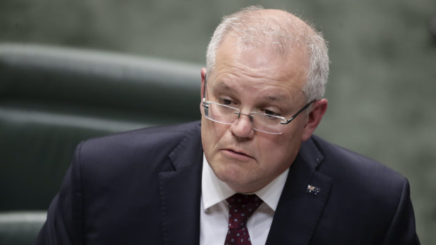 Scott Morrison will remain at arm's length from the plan to outsource the visa processing system.