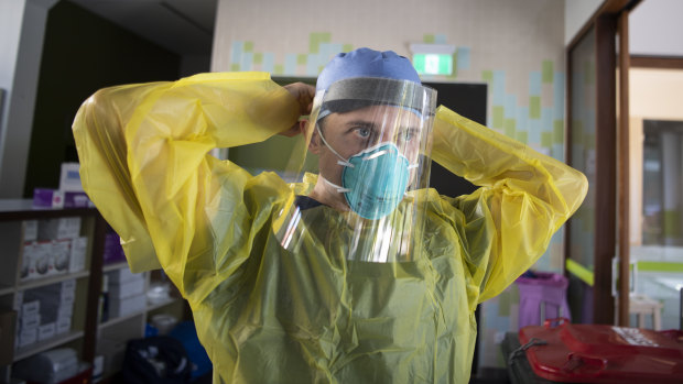Nurse Jarrod Tunks prepares ahead of testing at the new Covid-19 clinic in Darlinghurst.