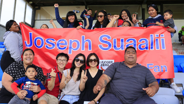 Entourage ... Joseph Suaalii’s friends and family, including uncle Amani (front right).