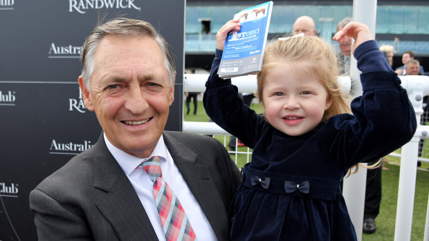 Lucky charm: Trainer Peter Snowden with his granddaughter Demi Harvey.