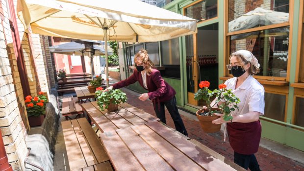 A restaurant in Exhibition Street, in Melbourne’s CBD, prepares to welcome back customers.