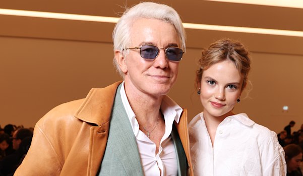 Baz Luhrmann and Isla Johnston, who will play Joan of Arc, at Paris Fashion Week in October.