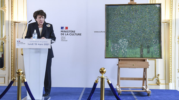 French Culture Roselyne Bachelot speaks next to a oil painting by Gustav Klimt painted between in 1905 called “Rosebushes under the Trees”.