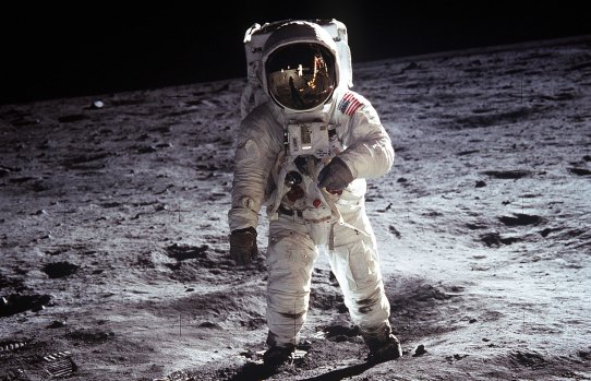 Buzz Aldrin’s helmet face cover reflects Apollo 11 commander Neil Armstrong taking his picture on the lunar surface.