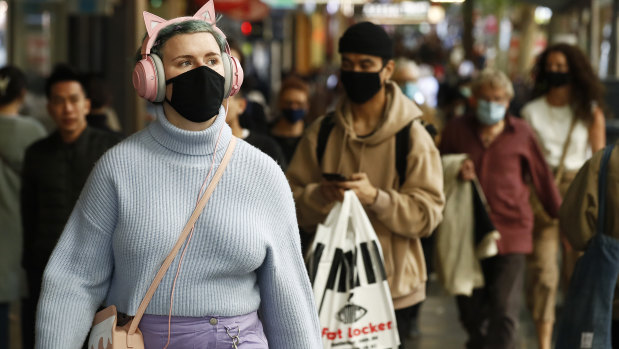People wearing masks in the CBD.