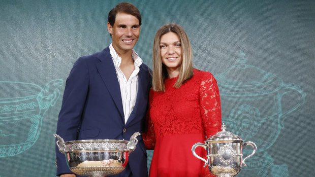 Defending French Open champions Rafael Nadal and Simona Halep at the draw in Paris.