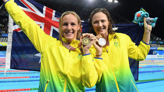 The Campbell sisters pose with their medals following the Womens' 100m freestyle final.