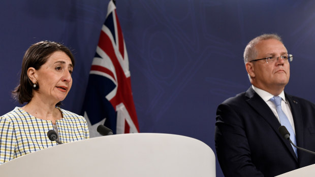 NSW Premier Gladys Berejiklian and Prime Minister Scott Morrison speak to the media in Sydney on Friday.