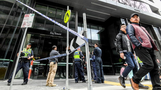 Police outside the Eq Tower on Friday.