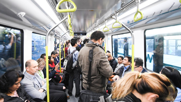 Passengers on a Metro Northwest driverless train this week.