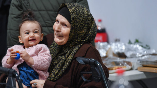 Feriha Emirali, 84, celebrates Eid, the end of the fasting month of Ramadan, with great granddaughter Meryem Deniz,1. 