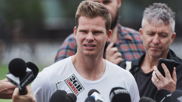 Hold the phone: Steve Smith talks to the press in Sydney on Friday.