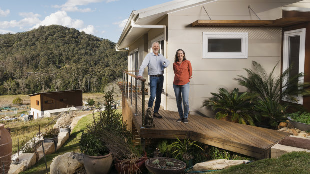 Tony and Teresa Farrell at the Narara housing community on the NSW Central Coast: they estimate that their greener house will save them $2000 a year.