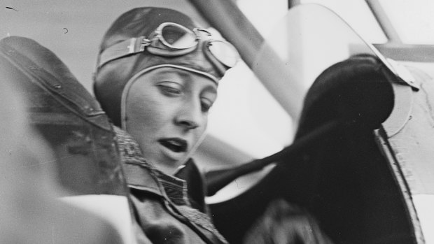 English aviatrix Amy Johnson in the cockpit of her plane, in Sydney shortly after the completion of her epic England-Australia solo flight, 1930