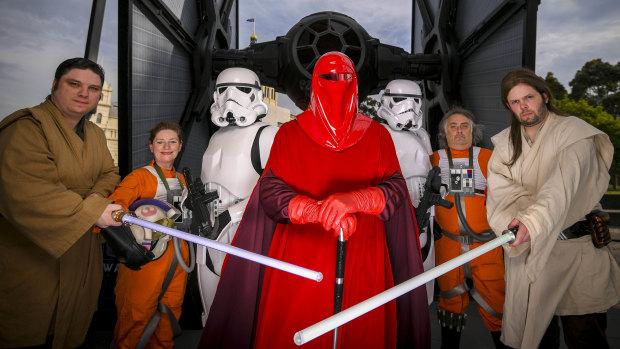 Star Wars fans in costume as the last movie in the franchise is released.