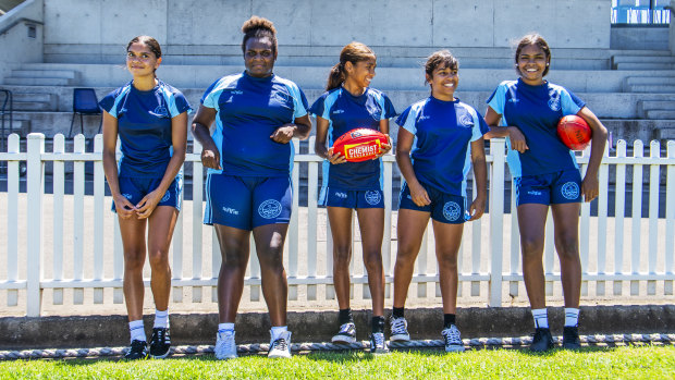 Aspiring footy players: St Scholastica's students from around the country play club footy for Drummoyne Power.