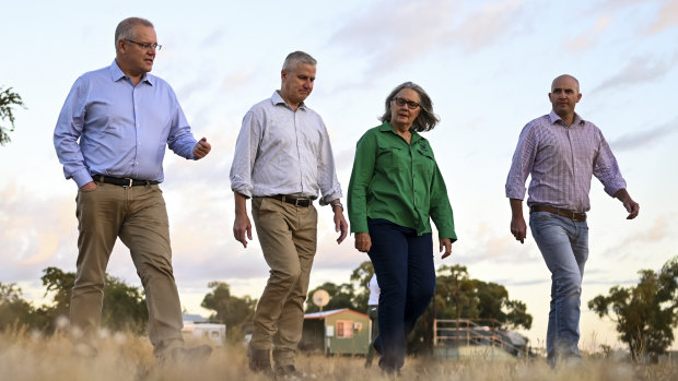 Prime Minister Scott Morrison and Deputy Prime Minister Michael McCormack speak to farmer Jacqueline Curley at Gipsy Plains Station near Cloncurry.