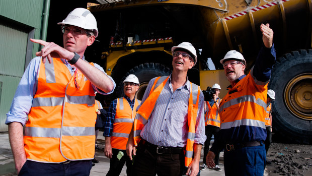 Treasurer Dominic Perrottet, Nationals leader John Barilaro and Upper Hunter Nationals candidate David Layzell at the Ravensworth open cut coal mine, north of Singleton.