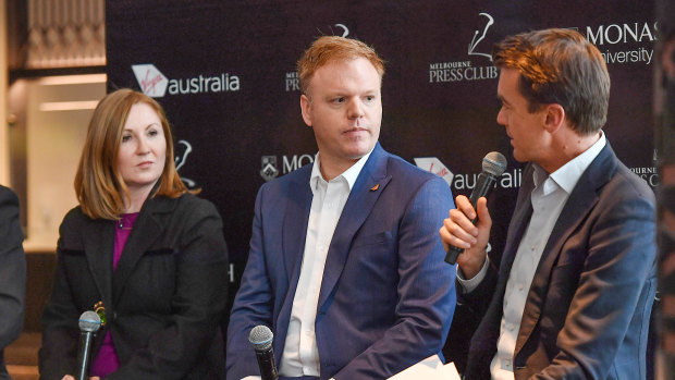Whistleblower Richard Boyle (centre) is pictured with journalist Adele Ferguson (left) and host Michael Rowland (right) at the panel on Tuesday.
