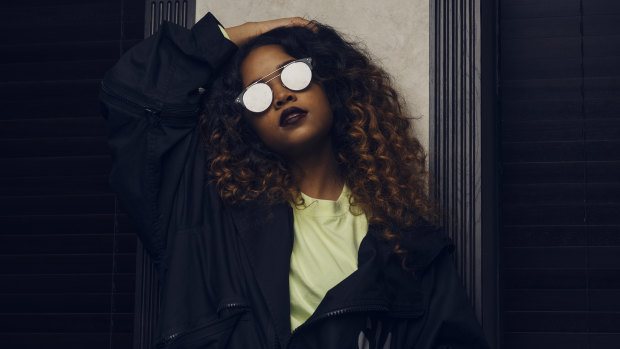 American R&B singer H.E.R. performs at Sydney Opera House as part of Vivid on Tuesday night.