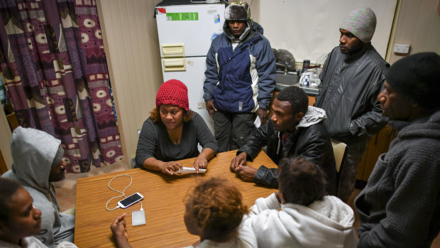 Tulia Roqara (wearing red beanie) at a meeting with other workers from Vanuatu in May 2018.