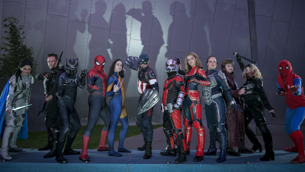 Avengers fans in cosplay outfits at Melbourne's IMAX Cinema.