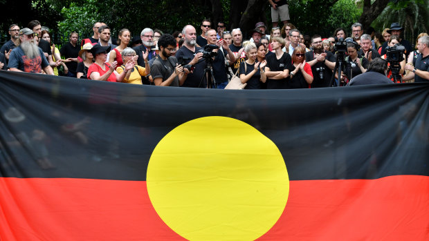 Wangan and Jagalingou traditional owners and their supporters are seen protesting outside Parliament House in Brisbane last year.