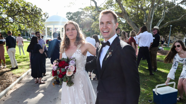 I do in a hurry: Sophie and Anders Ridley-Smith just managed to squeeze in their wedding vows on Sunday before Balmoral Beach was cleared.