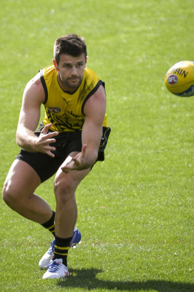 In sure hands: Richmond captain Trent Cotchin is returning to the game this weekend. 