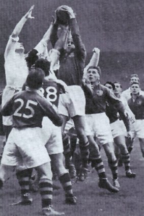 Eric Tweedale catches the ball against England.