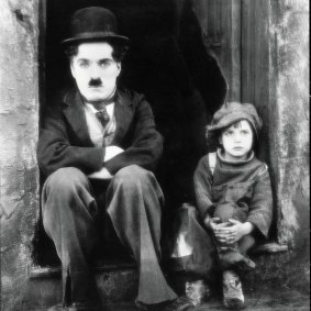 Charlie Chaplin and Jackie Coogan in The Kid. 