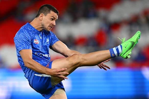 Luke Davies-Uniacke of the Kangaroos warms up.