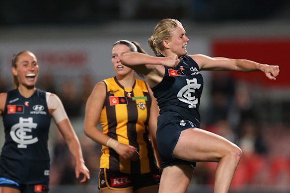 Lilly Goss celebrates a goal 