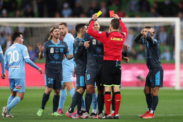 Sydney FC’s Luke Brattan sees red just after the half-hour mark.