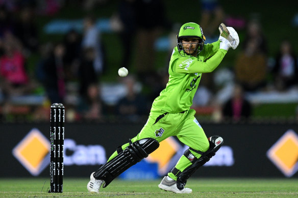 Nida Dar of the Thunder plays a shot during the Women's Big Bash League match.