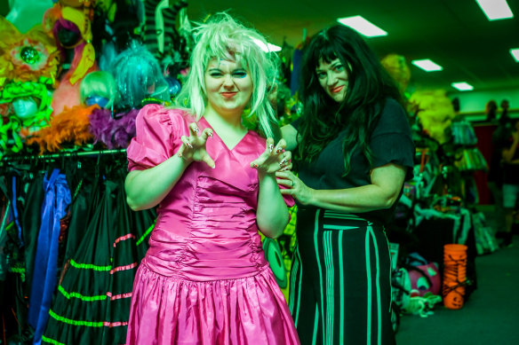 Bianca Faye (right) fits out niece Denique with a Weird Barbie outfit for Halloween.