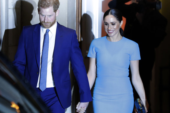 Farewell: Britain's Prince Harry and Meghan, the Duchess of Sussex, leave after attending the annual Endeavour Fund Awards in London.