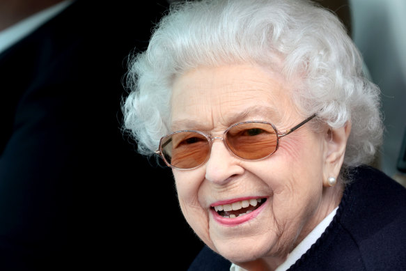 Queen Elizabeth II watches the horses from her Range Rover at The Royal Windsor Horse Show.