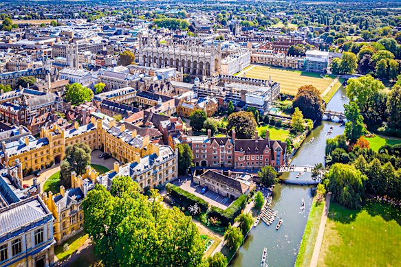 Punts glide along the River Cam past Cambridge’s historic colleges and lush Backs.
