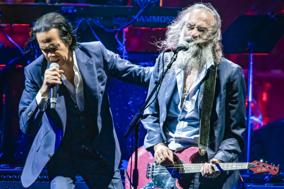 Nick Cave and Warren Ellis on stage in Italy in July.