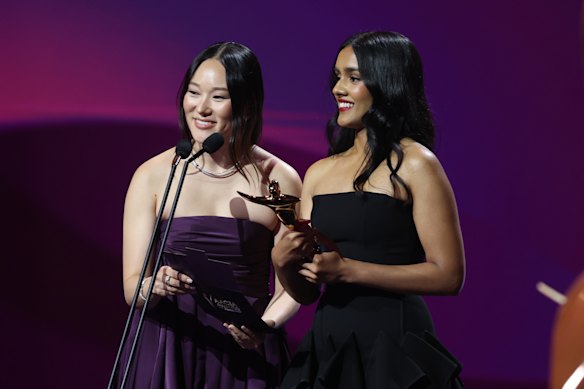 Yerin Ha and Shabana Azeez, who stars in The Pitt, present the AACTA Awards earlier this month.